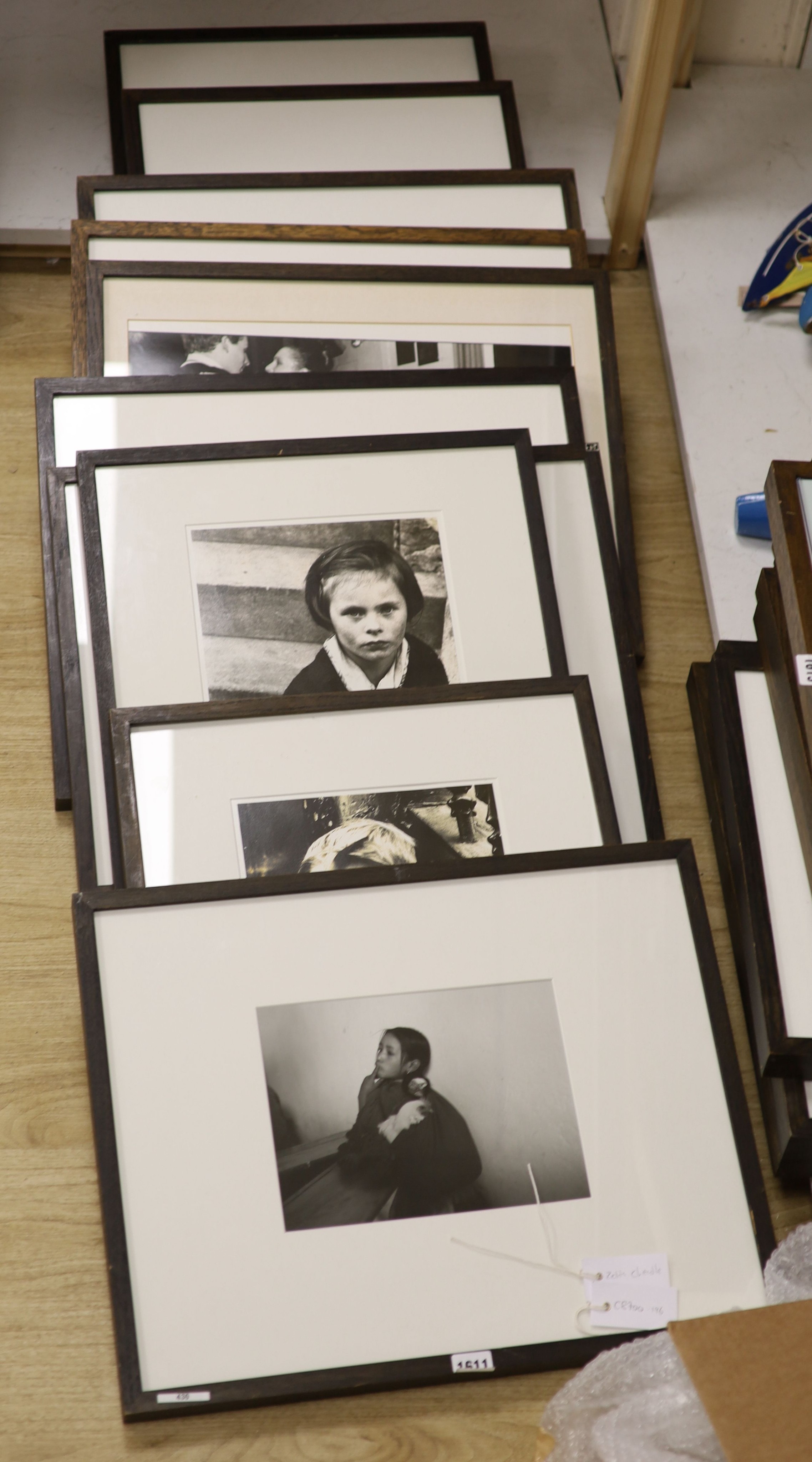 A collection of contemporary black and white photographs: Marianna Yampolsky in the classroom and Himpill de Tapas, Roger Mayne Boy, St Stephens Gardens, signed and dated '57, and